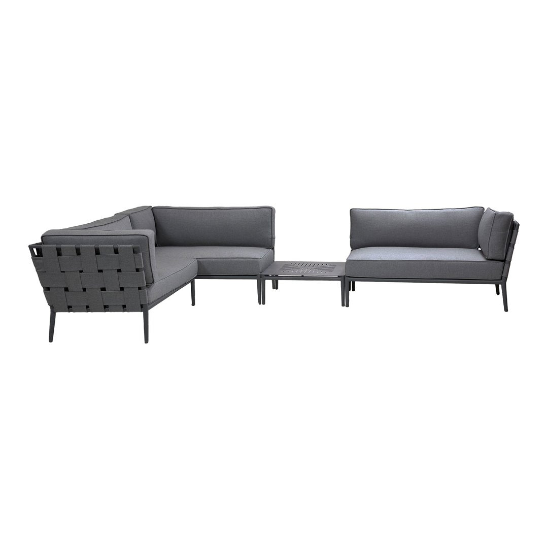 Gray sectional sofa with sleek lines and breathable fabric, perfect for modern outdoor setups.