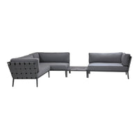 Gray sectional sofa with sleek lines and breathable fabric, perfect for modern outdoor setups.