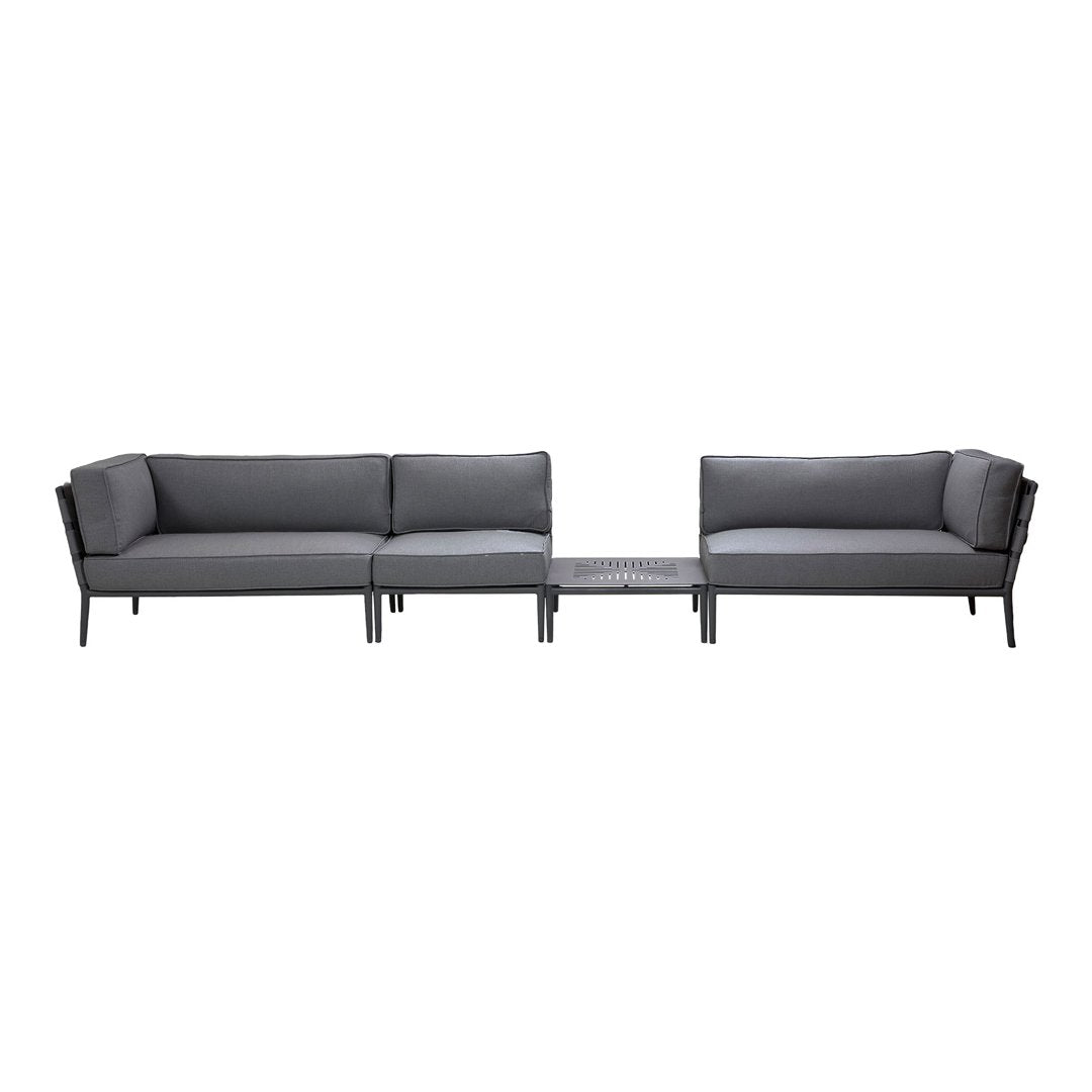 Gray outdoor sectional sofa with sleek fabric cushions and a minimalist black frame, perfect for modern patios.