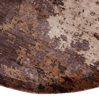Textured area rug featuring rich shades of brown, beige, and subtle abstract patterns. Ideal for stylish interiors.