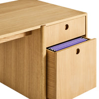 Natural wood desk in light oak finish, featuring a smooth texture and minimalist design with a pop of purple files inside.