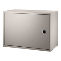 Glossy silver metal storage box with a sleek, minimalist design and circular access hole. Ideal for modern decor.