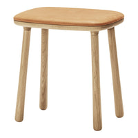 Light brown padded seat on natural wood legs, featuring a simple, clean design with smooth edges.