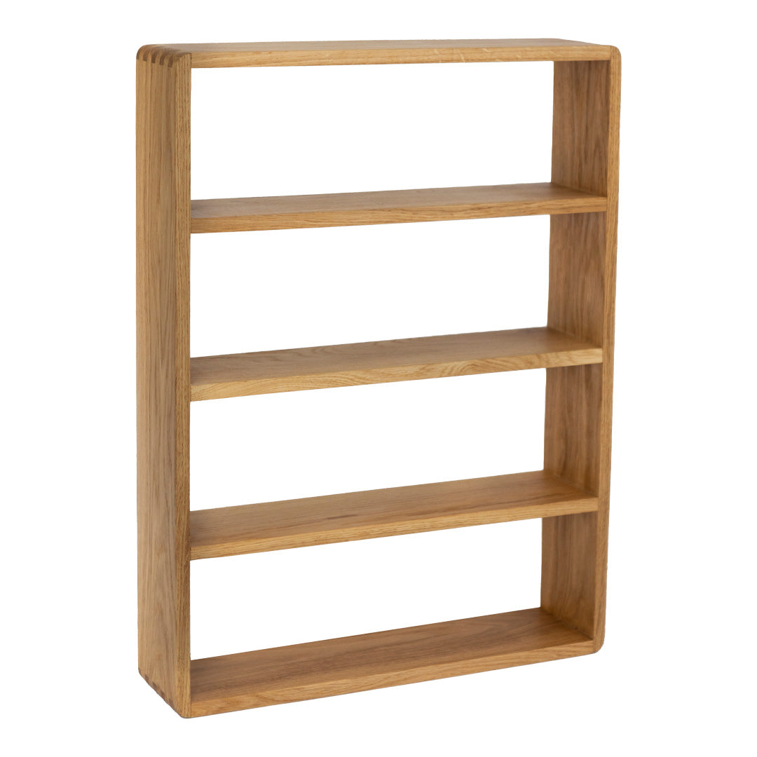 Light oak wooden bookshelf with a smooth finish and clean lines, featuring four open shelves for display.