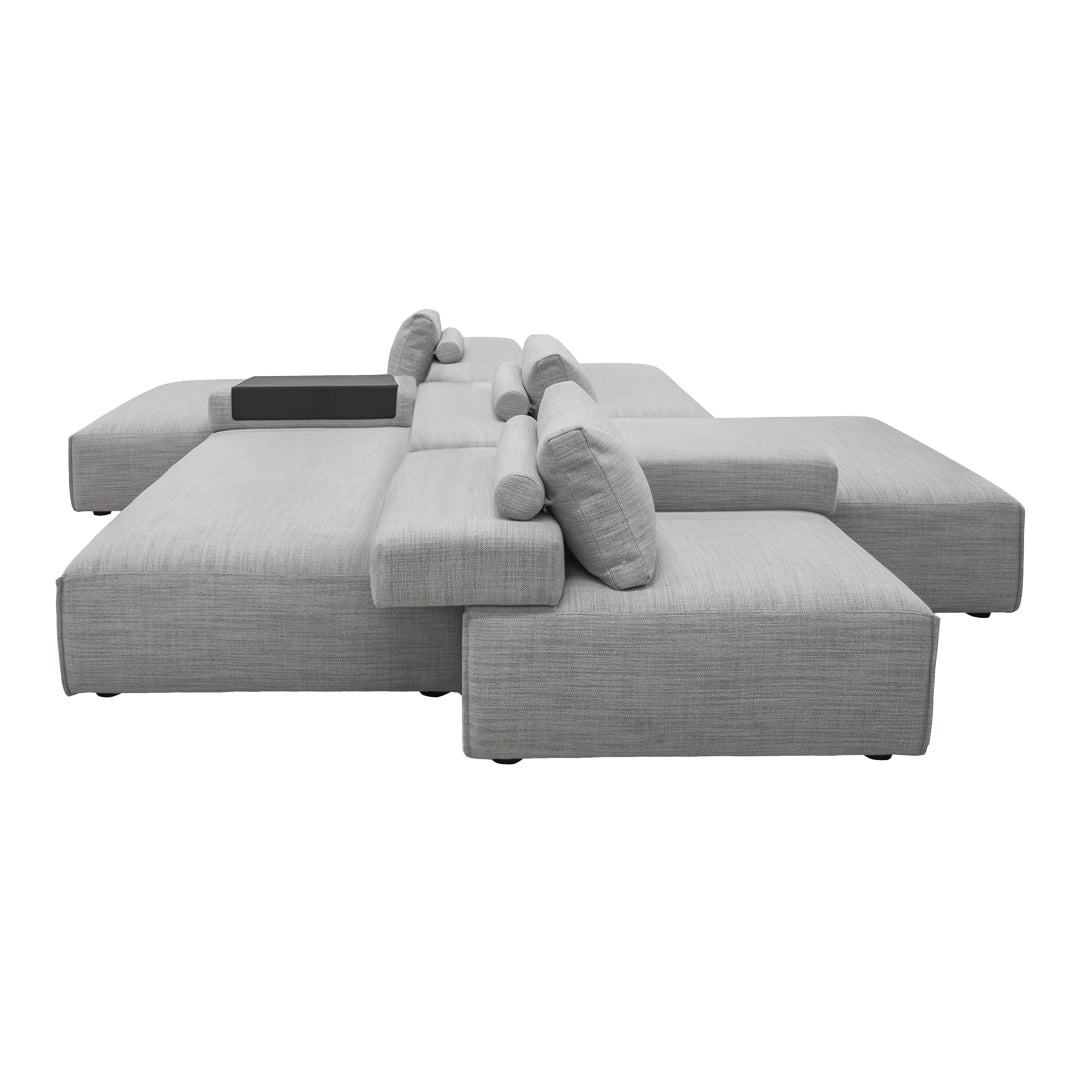 Gray modular sofa with textured fabric and plush cushions, featuring a modern minimalist design.