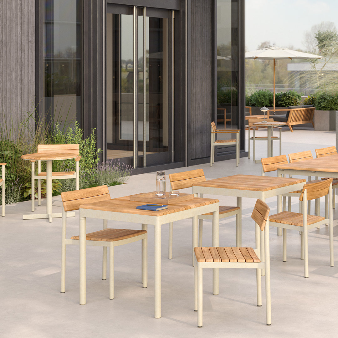"Modern outdoor furniture set featuring light beige frames and natural wood slats, set against a stylish patio backdrop."