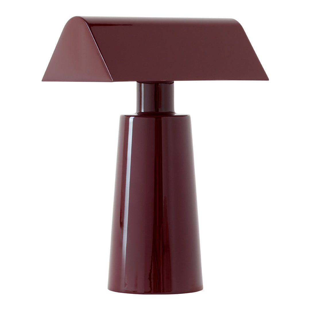  burgundy lamp with a smooth, glossy finish and a modern geometric design. Perfect for stylish decor.