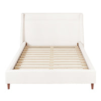 White upholstered bed frame with a clean design and natural wood slats, enhancing minimalist decor.