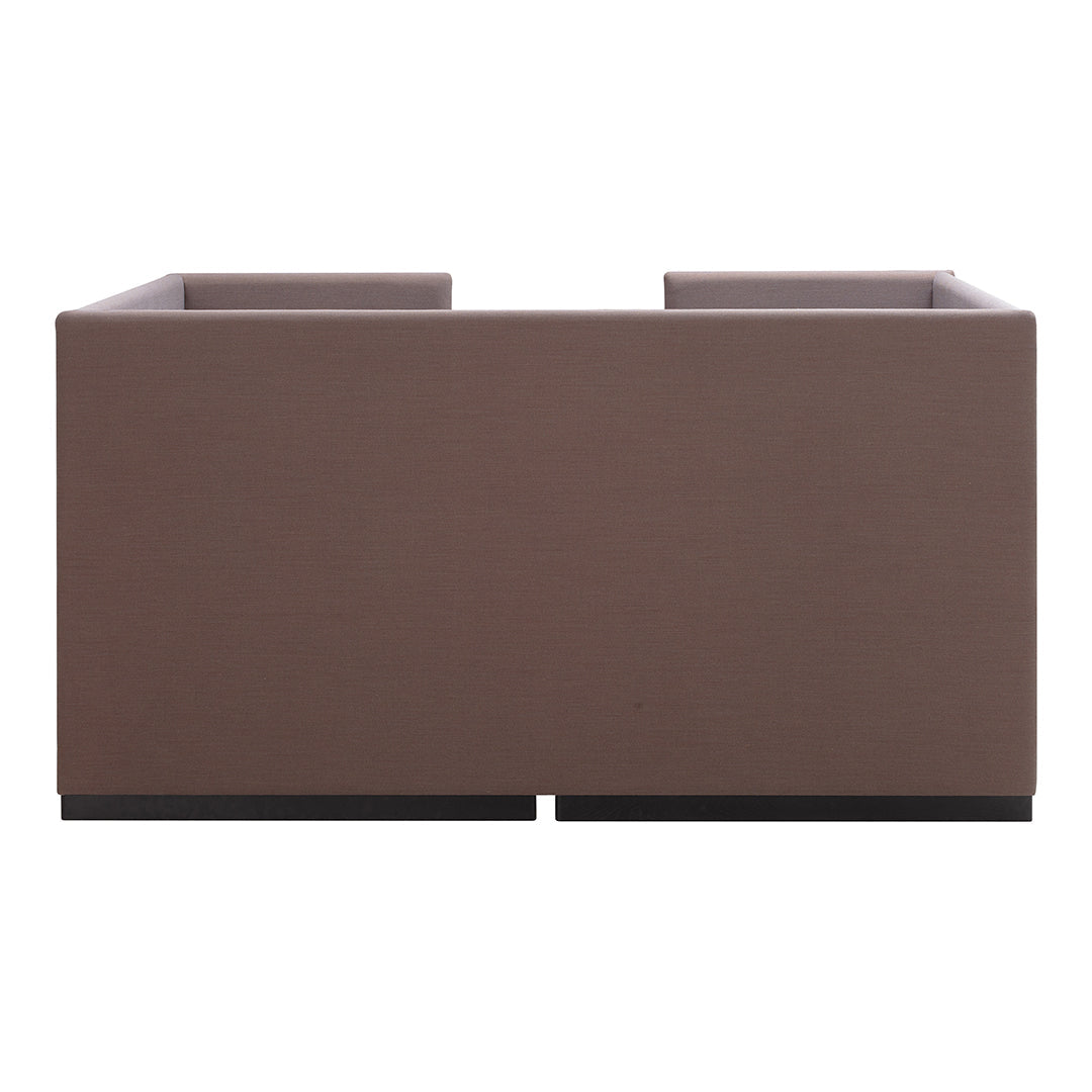 Brown minimalist sofa with a smooth texture and clean lines, featuring a modern design on a black base.