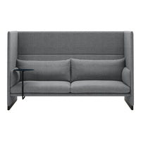 Gray upholstered sofa with clean lines and a minimalist design, featuring a sleek side table attachment.