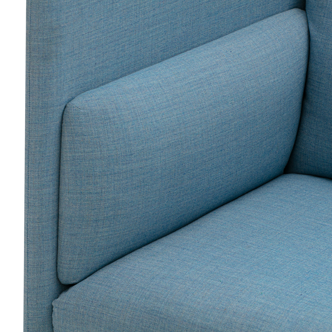 Light blue textured upholstery with a subtle pattern, perfect for modern home decor. Ideal for stylish seating arrangements.