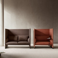 Double modern upholstered sofas in rich brown and warm terracotta colors, featuring sleek, minimalist lines.