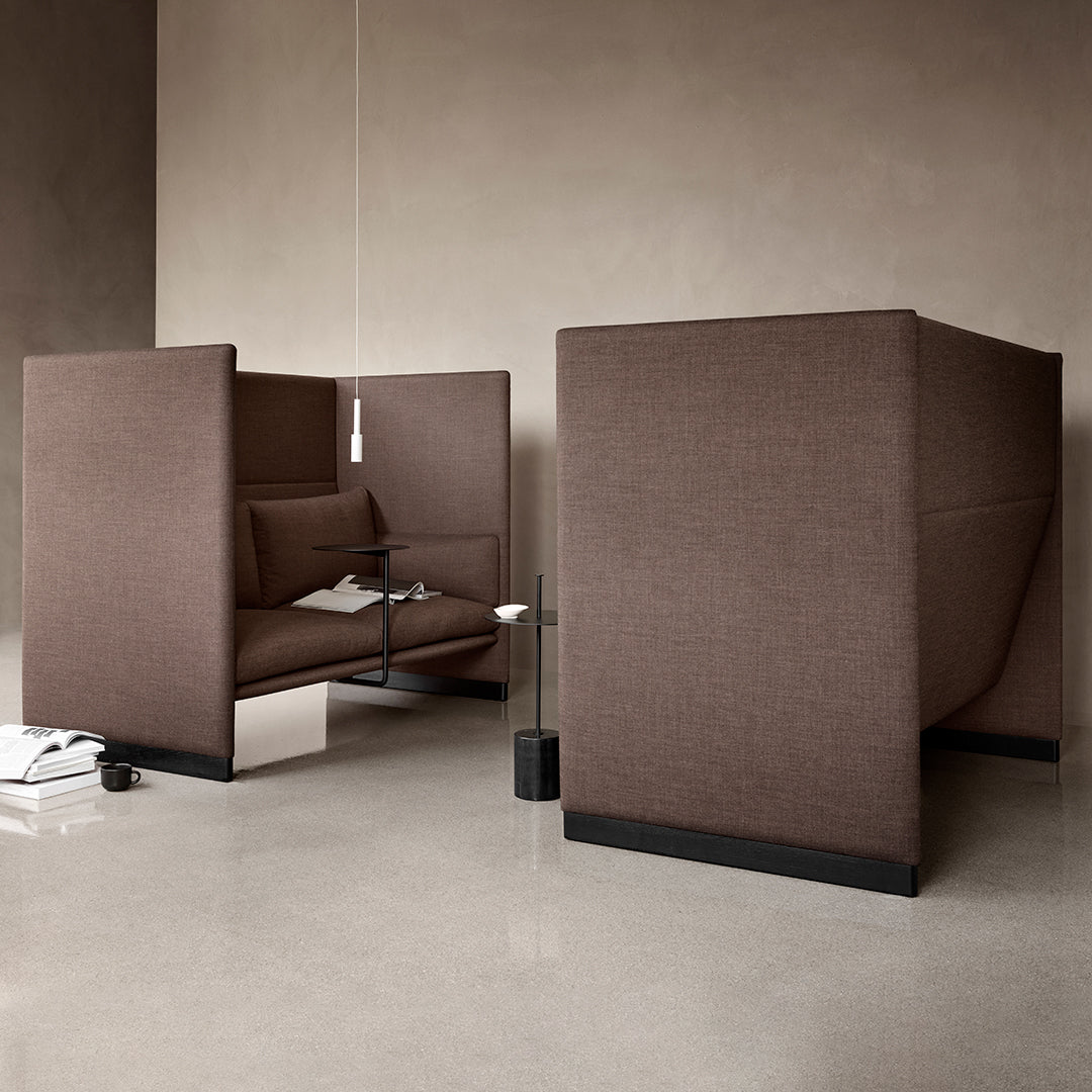 Brown modular seating with a sleek fabric texture, featuring minimalist design and geometric lines. Perfect for modern interiors.