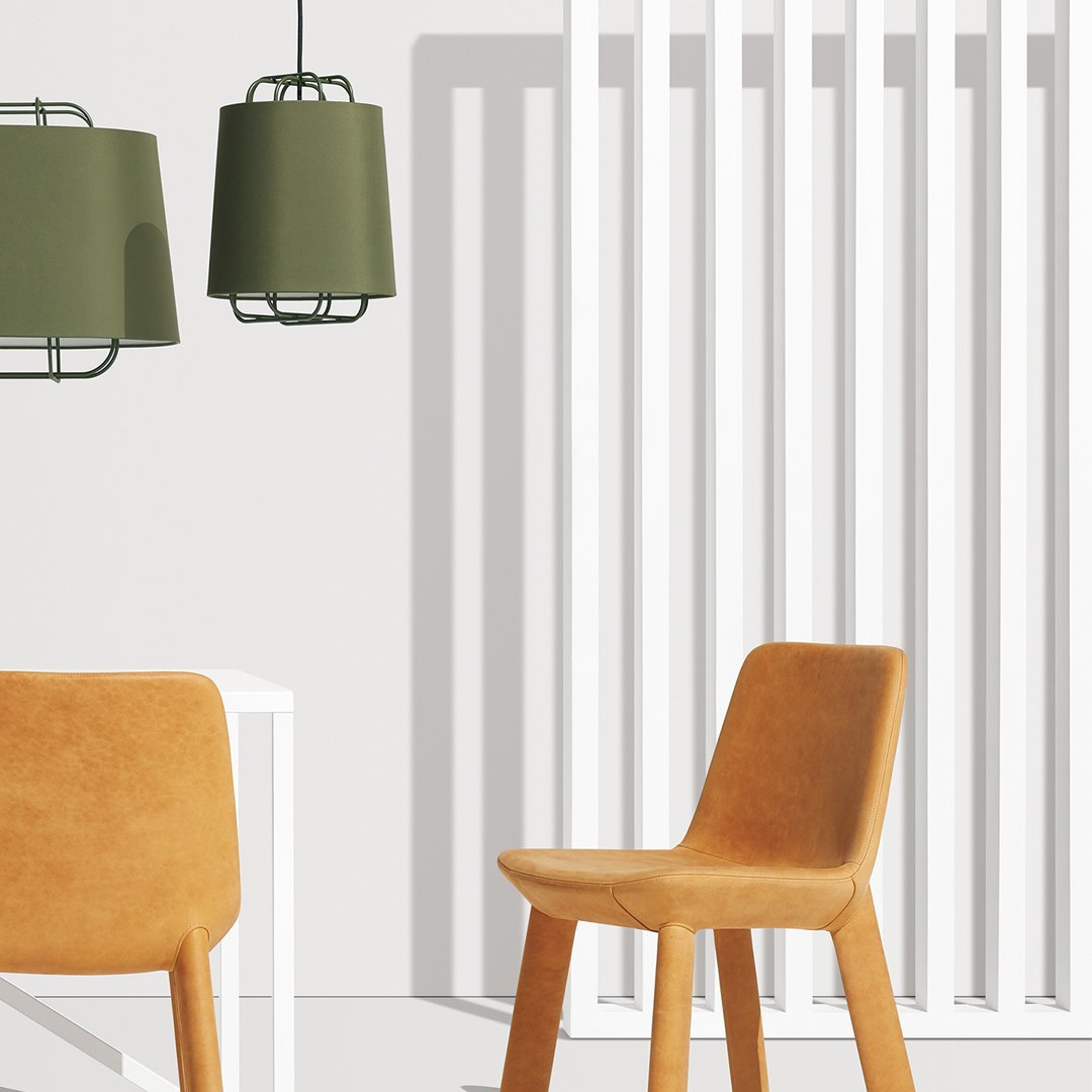 Tan chair with sleek lines, green lampshade, and contrasting white vertical slats in a modern setting.