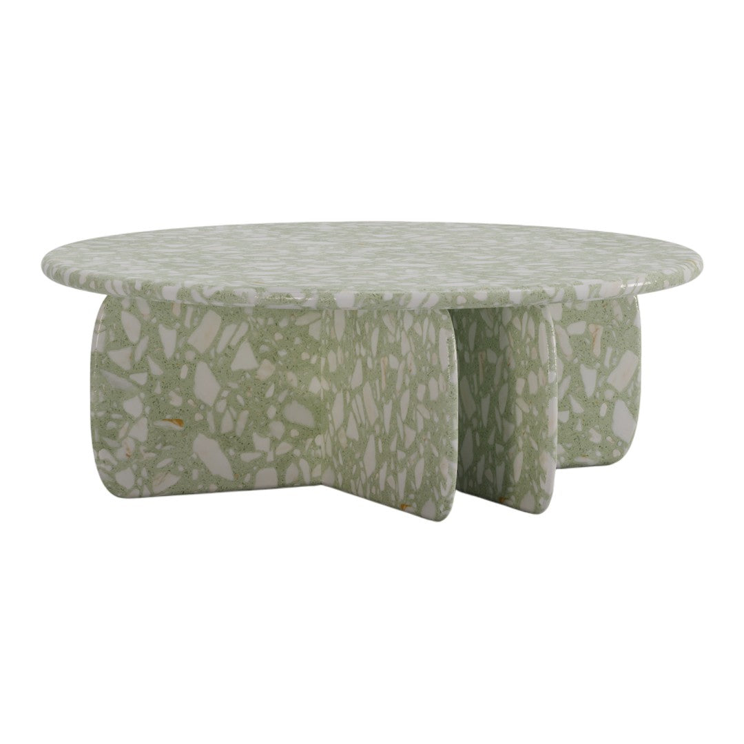 Round coffee table in soft green with a textured, speckled pattern, perfect for modern decor.