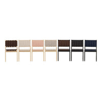 Set of chairs featuring a range of colors: beige, blush, dark brown, and black with woven patterned seats.