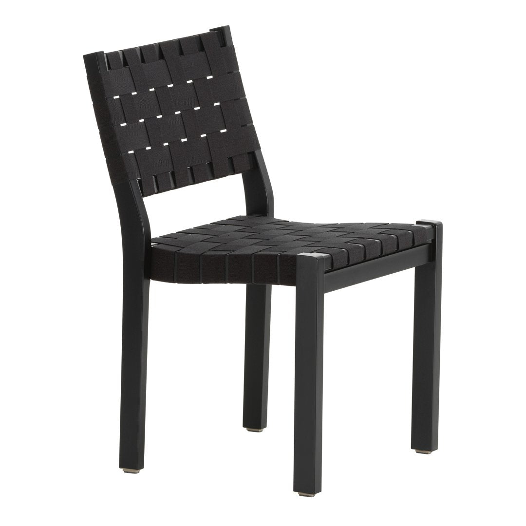 Black woven chair with a minimalist design and sturdy black legs, showcasing a sleek, modern aesthetic.