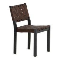 Brown woven pattern chair with black metal frame, featuring a sleek, modern design. Ideal for contemporary spaces.