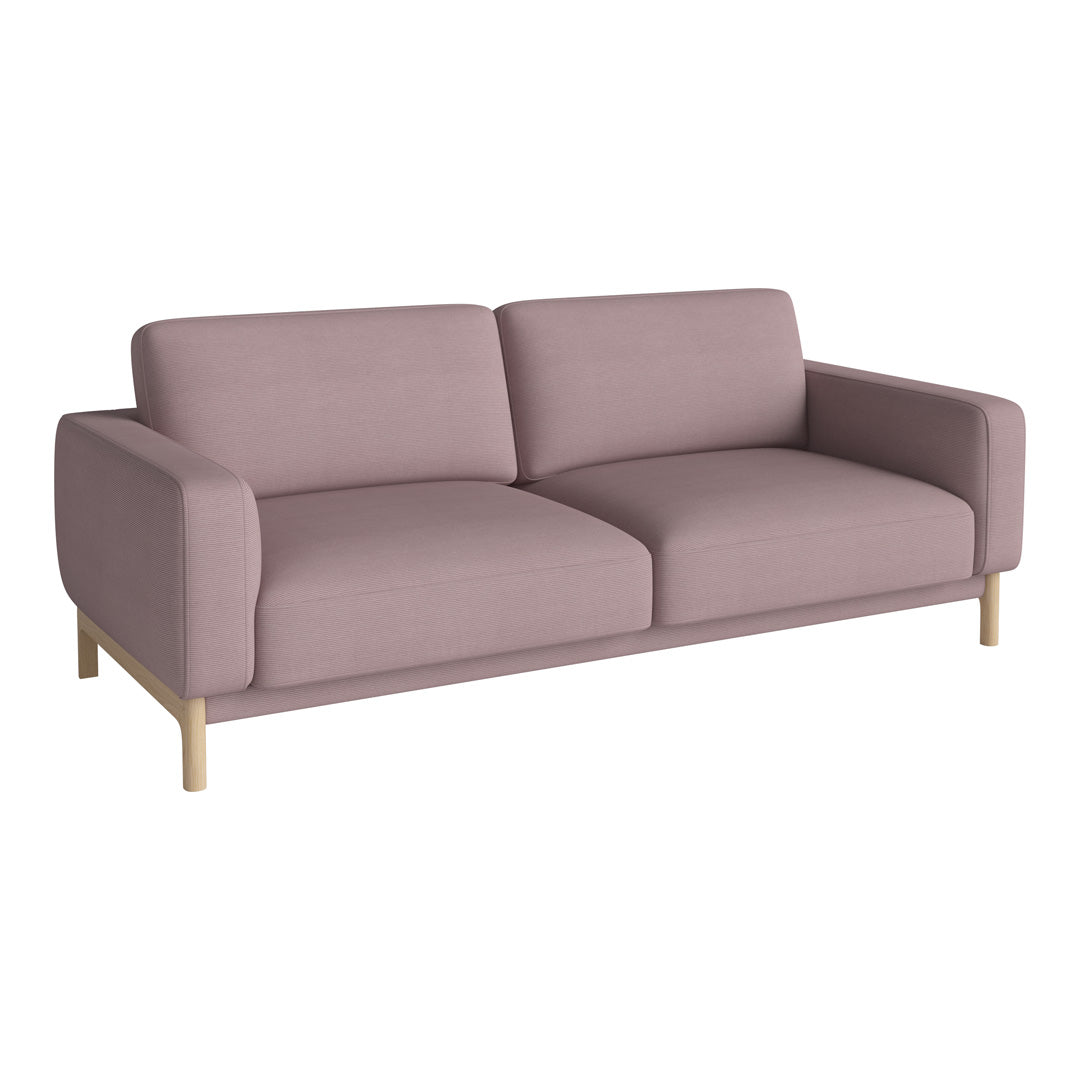 Modern pink fabric sofa with clean lines and light wood legs, perfect for contemporary living spaces.