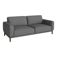 Gray upholstered sofa with a sleek, minimalist design and wooden legs, perfect for modern living spaces.