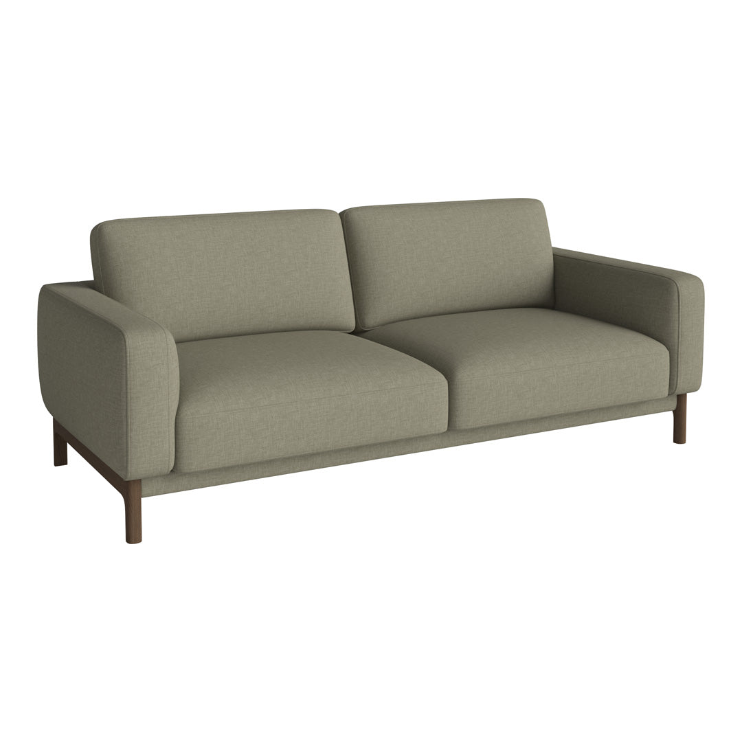 Stylish two-tone sofa in muted olive green fabric with soft, clean lines and wood legs for a modern touch.