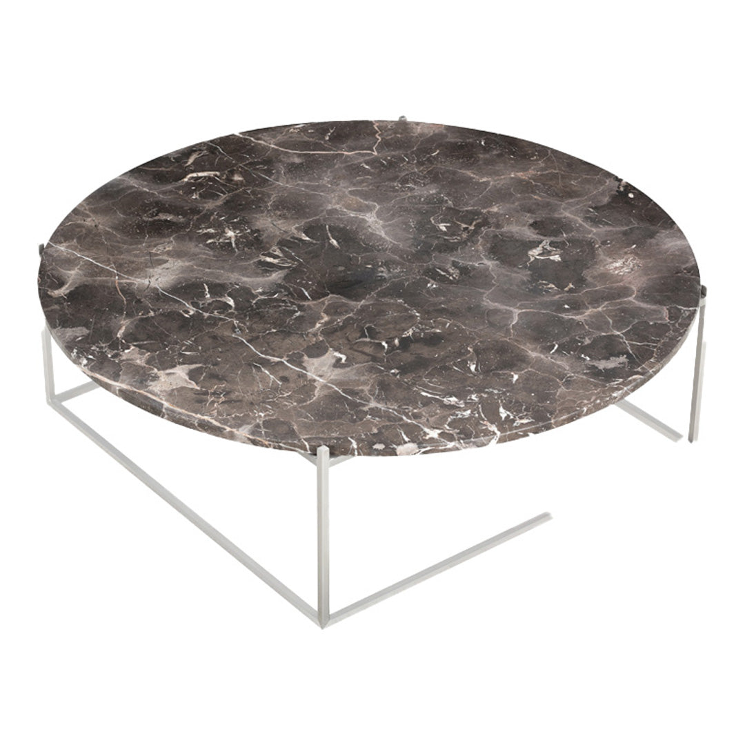 Round coffee table with a dark marbled top featuring gray, brown, and white swirls, supported by a sleek metal base.