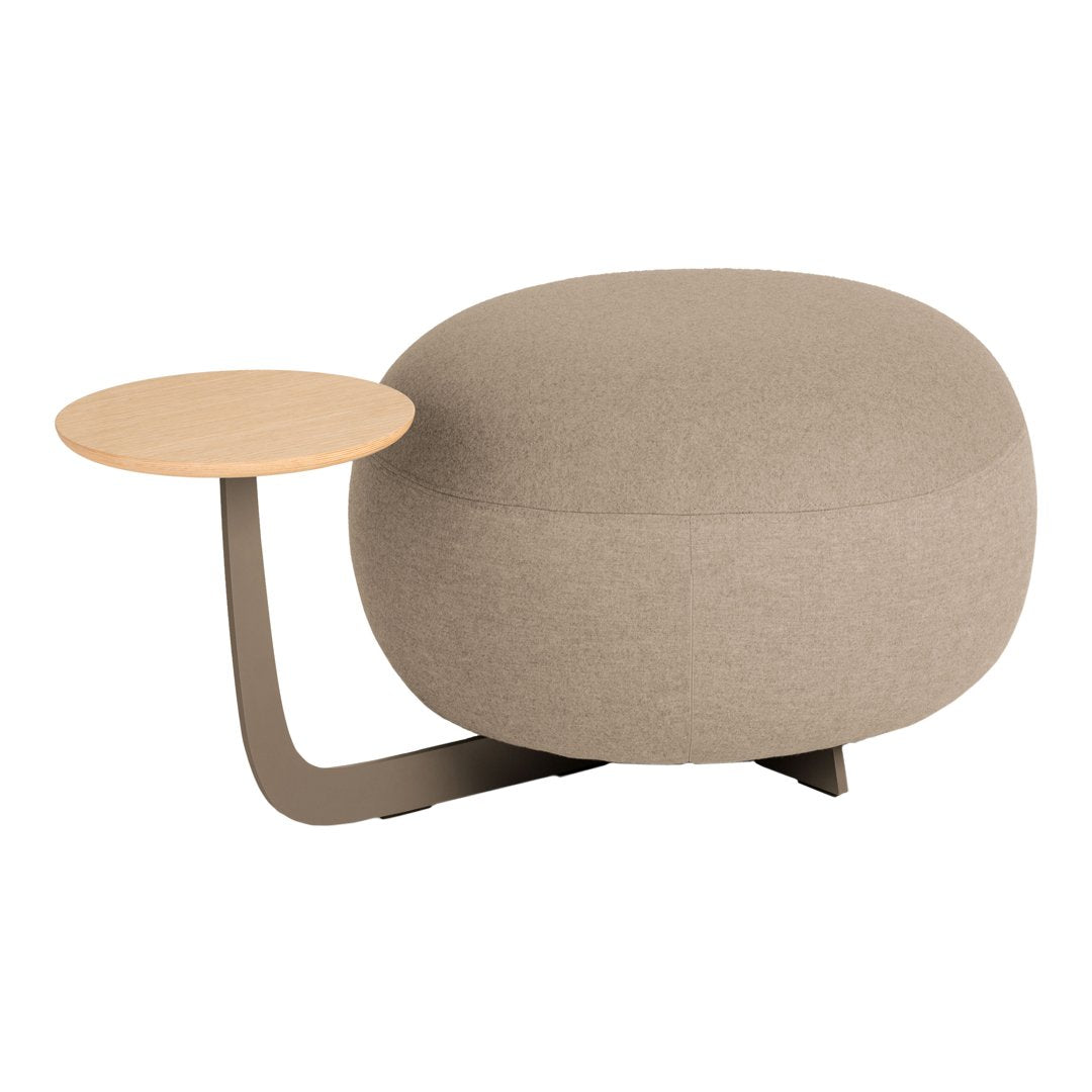 Beige upholstered ottoman with a light wooden side table, featuring a smooth, round shape and minimalistic design.