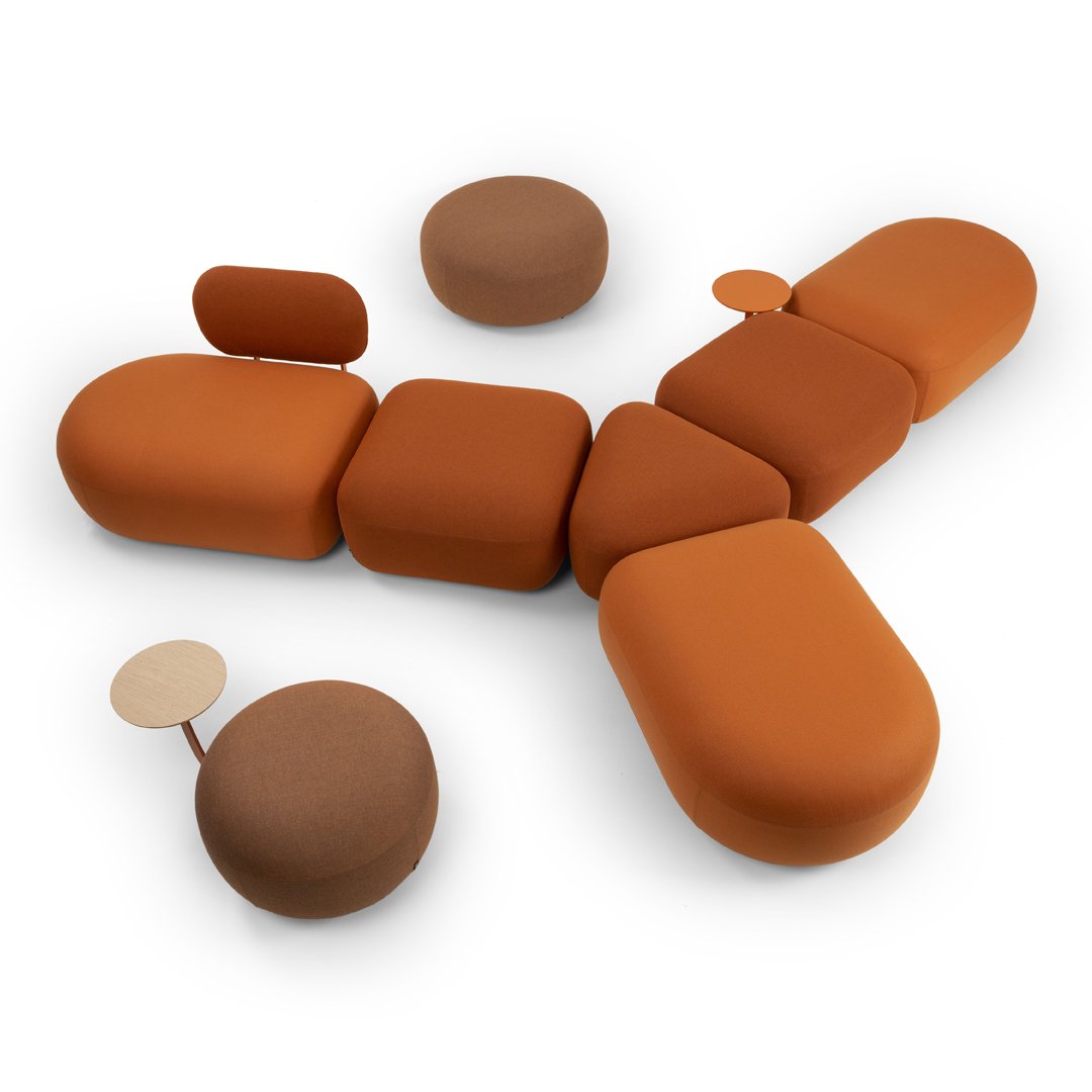 Modern modular seating set in rich terracotta and warm brown tones with smooth, rounded shapes and minimalist design.