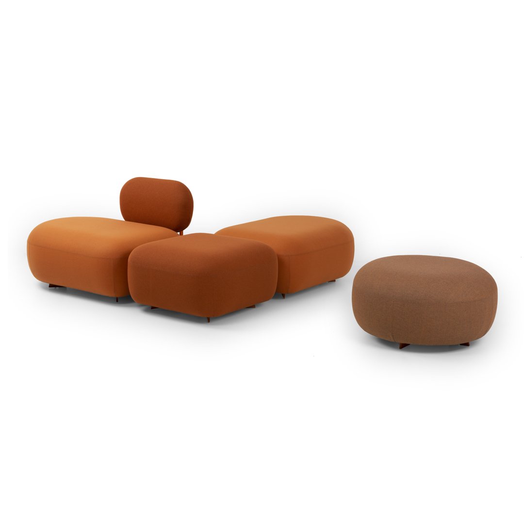 Soft orange and brown modular couch set with curved shapes, perfect for modern living spaces.