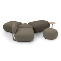 "Modern seating in muted olive green with soft, rounded shapes and minimalistic design."