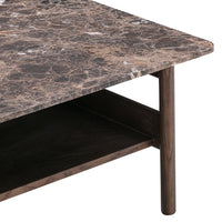 Brown marble table with intricate veining pattern, complemented by a dark wood frame. Perfect for modern decor.