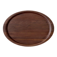 Oval wooden serving tray in deep brown with a smooth finish and subtle grain patterns. Ideal for stylish dining.