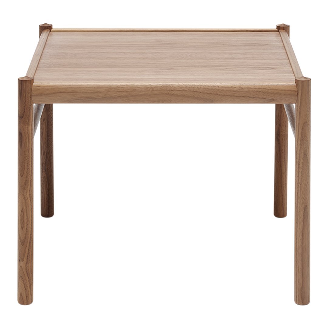 Solid walnut square table with a smooth, natural wood finish and minimalist design. Perfect for modern decor.