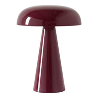 Burgundy modern table lamp with a sleek, glossy finish and minimalist design. Perfect for contemporary decor.