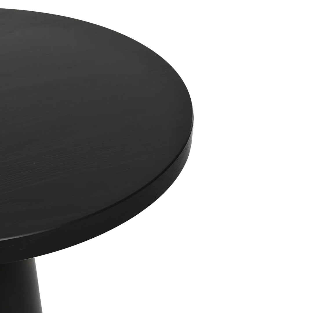 Round black table top with a smooth, matte finish, perfect for modern minimalist decor.