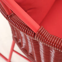 Red woven basket chair with smooth, vibrant red cushions, featuring sleek, glossy red accents. Perfect for stylish decor.