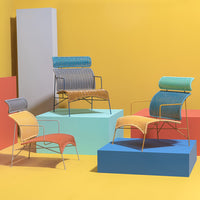 Colorful modern chairs in vibrant hues of orange, blue, and teal with striped and textured patterns against a yellow backdrop.