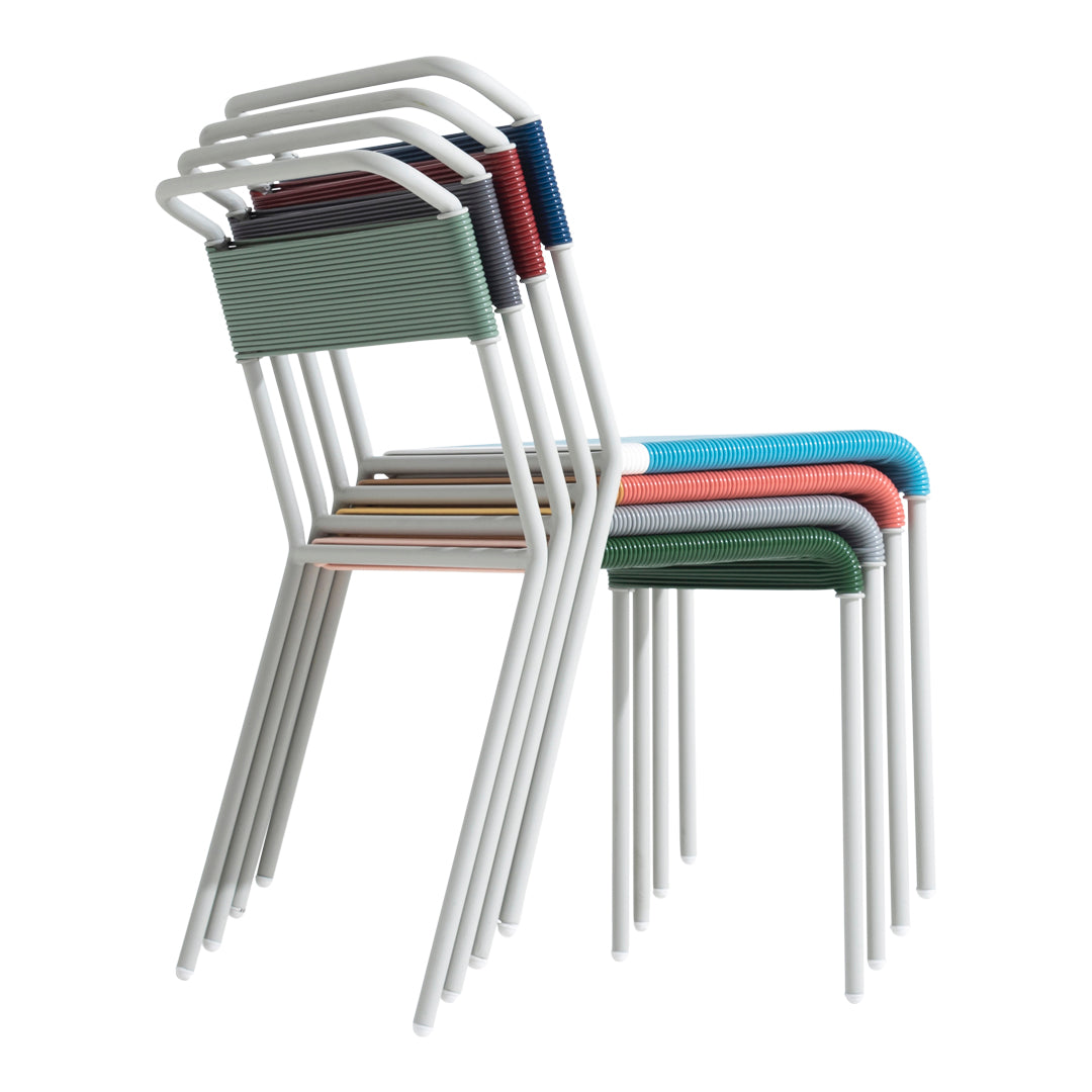 "Stack of modern chairs featuring vibrant colors: green, blue, orange, and soft gray with a sleek white frame."