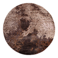 Round area rug featuring earthy tones of brown and beige with a textured, abstract pattern. Perfect for modern decor.