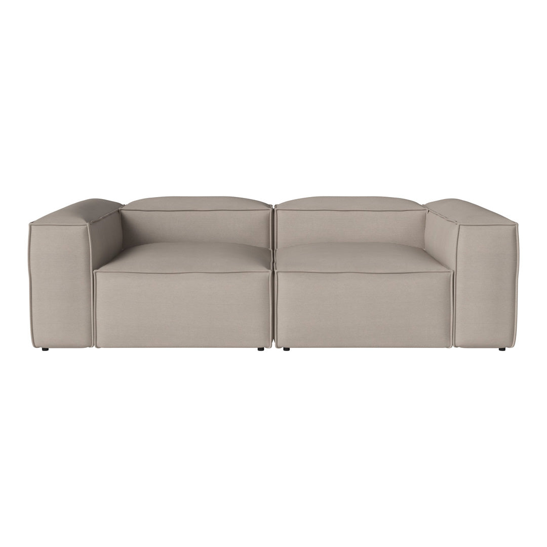 Stylish beige modular sofa with a sleek, contemporary design and smooth, textured fabric. Perfect for modern spaces.