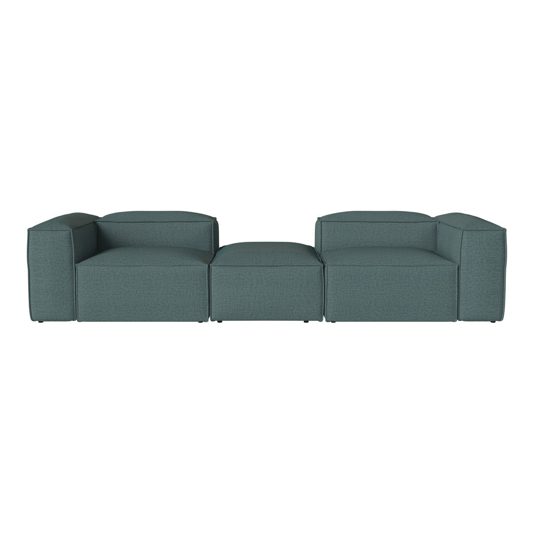 Teal modular sofa with clean lines and a textured fabric design, perfect for modern living spaces.