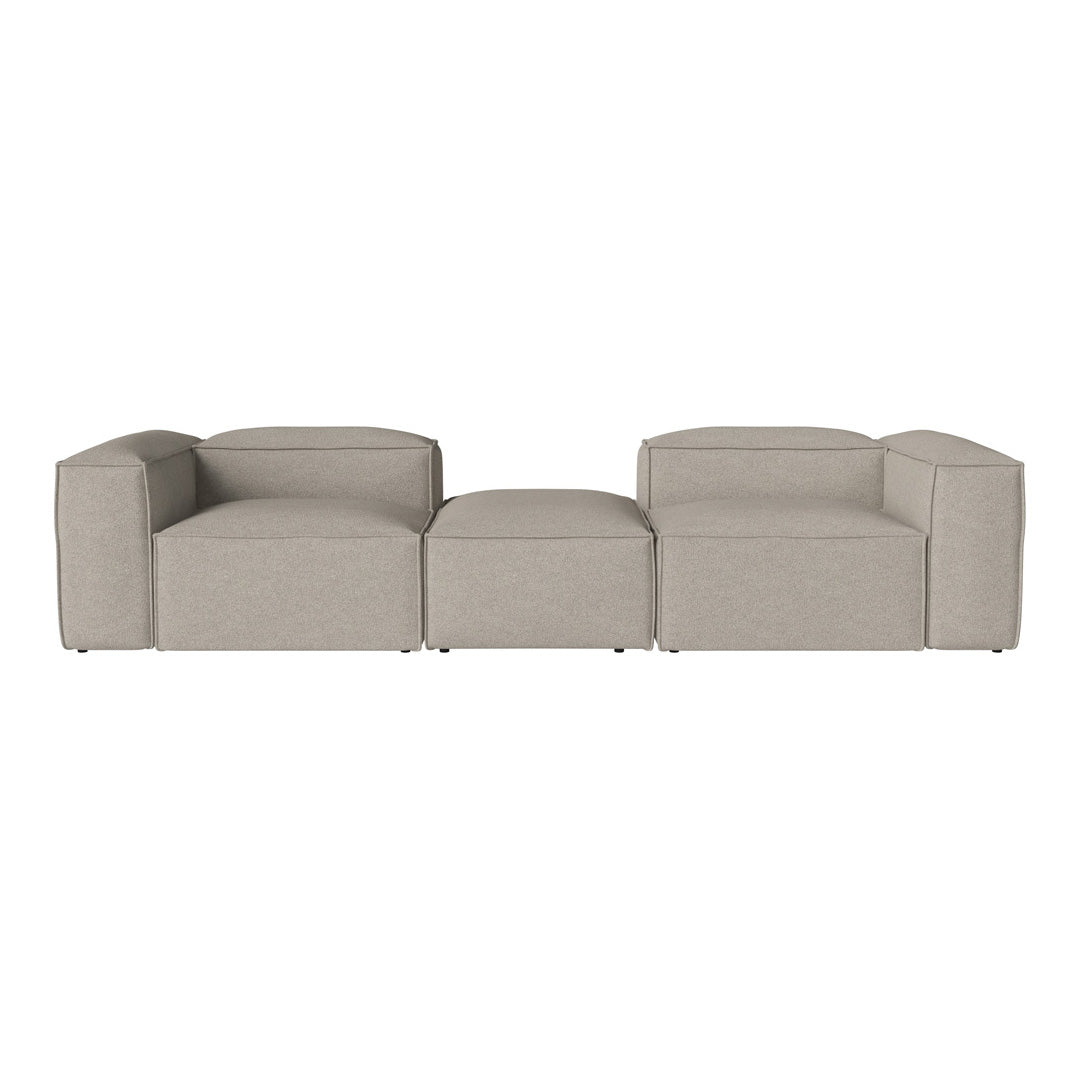 Beige modular sofa with a minimalistic design and smooth fabric texture. Contemporary style for versatile decor.