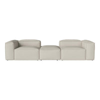 Modern modular sofa in soft beige with minimalist, geometric design and smooth upholstery.
