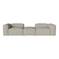 Light gray modular sofa with clean lines and a minimalist design, featuring smooth upholstery and no visible patterns.