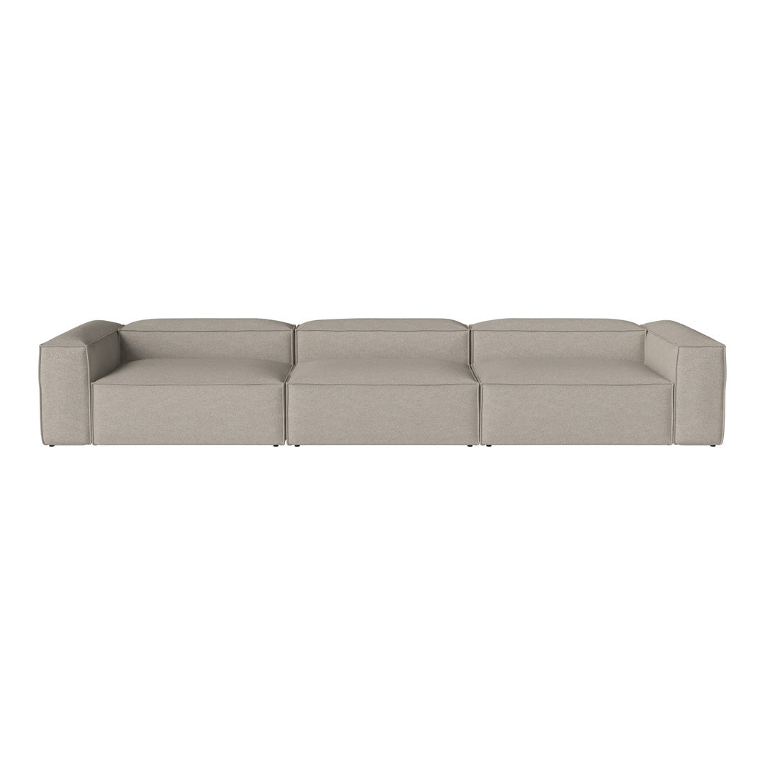 Beige modular sofa with a sleek, modern design and clean lines, perfect for contemporary living spaces.