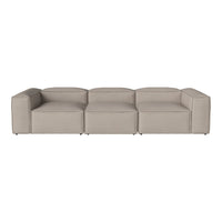 Beige modular sofa with clean lines and contemporary design, featuring a smooth, textured fabric upholstery.