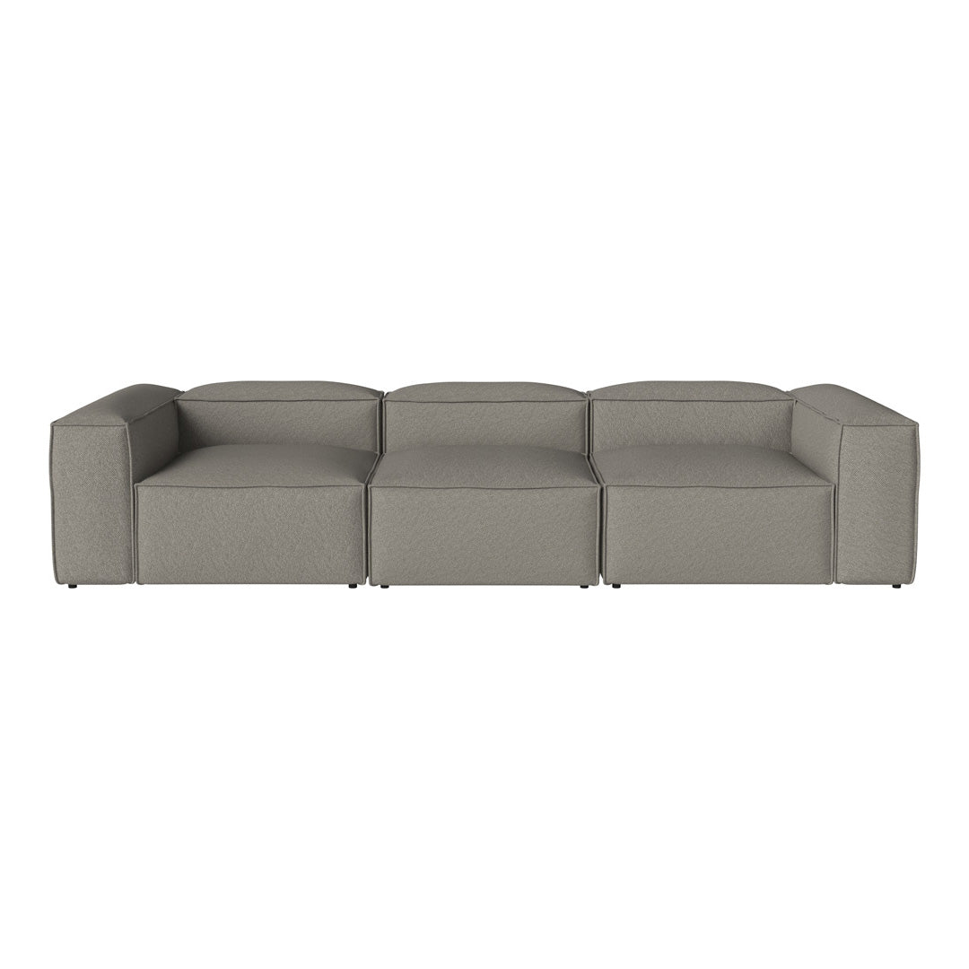 Gray sectional sofa with a minimalist design and smooth fabric texture, featuring clean lines and a contemporary aesthetic.