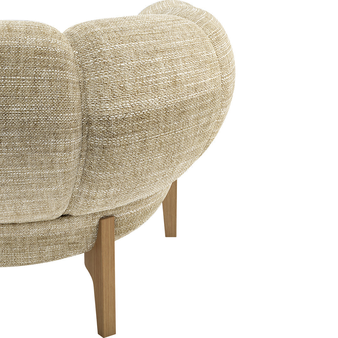 Beige textured fabric with a soft, round silhouette and natural wood legs. Perfect for cozy modern interiors.