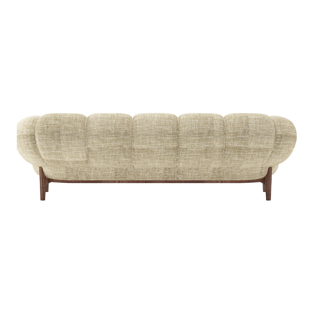 Textured beige sofa with a rounded back and dark wooden legs, offering a modern and cozy design.
