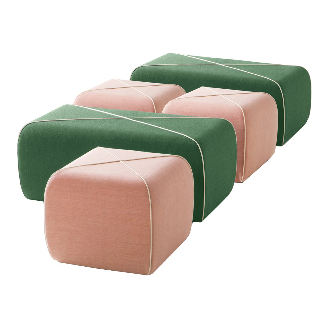 "Set of four modern ottomans in green and blush pink with textured fabrics and stylish seams."